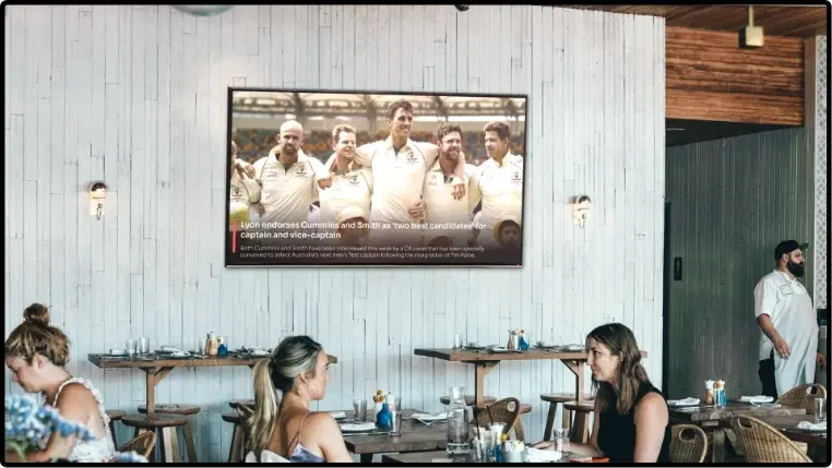 Digital signage ESPN News app layout preview showing news topic image on the background and text placed at the bottom