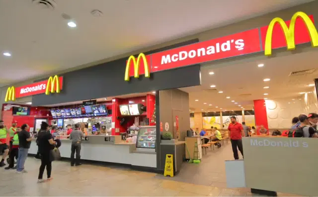 McDonald's India restaurant showing digital menu boards powered by Pickcel