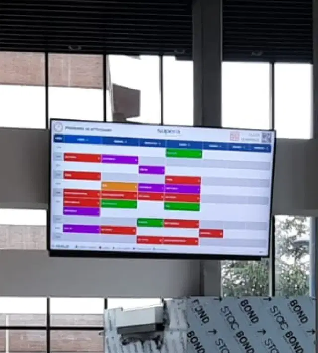 Digital signage content playing on a display at office premises which is powered by Pickcel
