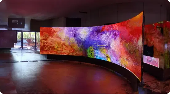 An office digital screen with a welcome onboard message