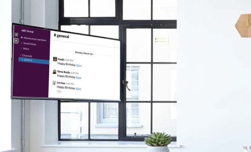 Digital signage displaying Slack messages for team appreciation and recognition on special occasions