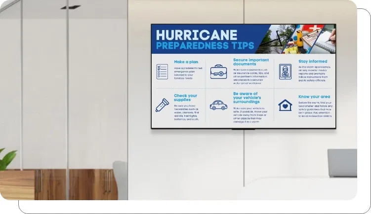 An office digital signage screen flashing an emergency message