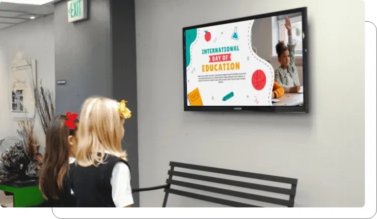 Digital screen showcasing student artwork and projects