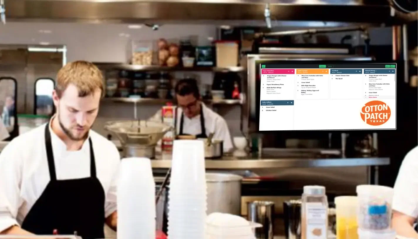 Cotton Patch Cafe digital signage screen showing internal communications and promotions.