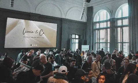 new product launch of Licesia and Co. showing their presentation in a large digital signage screen at an exhibition hall new product launch of Licesia and Co. showing their presentation in a large digital signage screen at an exhibition hall