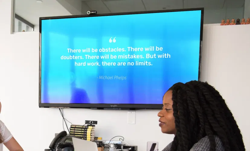 Digital signage screen placed outside pitching room showing motivational quote using Pickcel digital signage software Digital signage screen placed outside pitching room showing motivational quote using Pickcel digital signage software