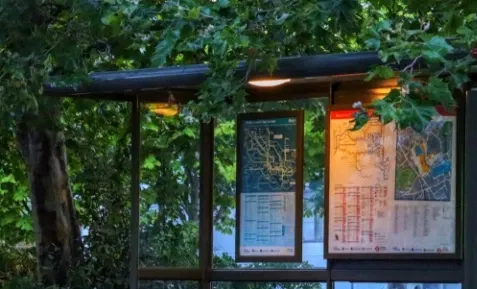 Digital signage showing weather alerts for commuters at public transportation locations Digital signage showing weather alerts for commuters at public transportation locations