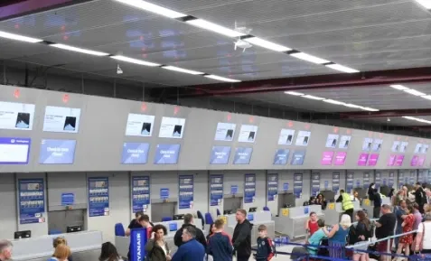 Digital signage at airport displaying weather updates to help airlines and passengers Digital signage at airport displaying weather updates to help airlines and passengers