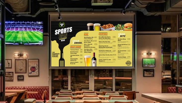 A bar with digital menu boards showing drinks and food menu A bar with digital menu boards showing drinks and food menu