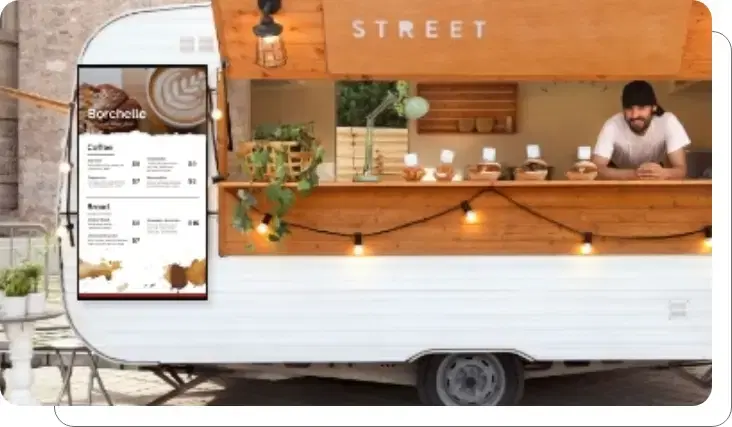 A Feast for the Eyes digital menu board showing menu in food truck cafe