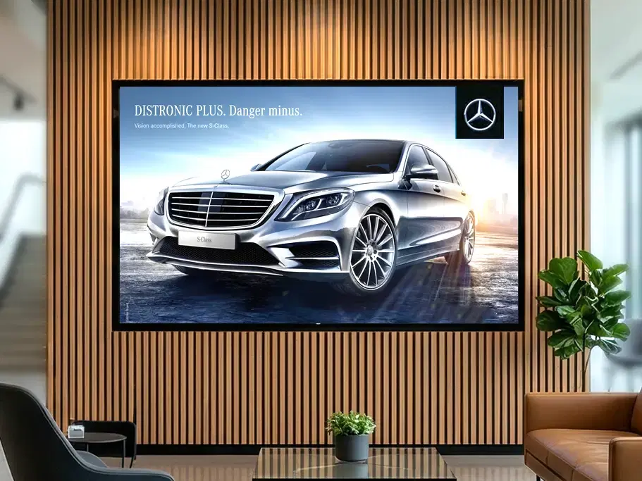 Mercedes-Benz customer story Mercedes-Benz car showroom with Pickcel-powered digital screen displaying corporate employee communication