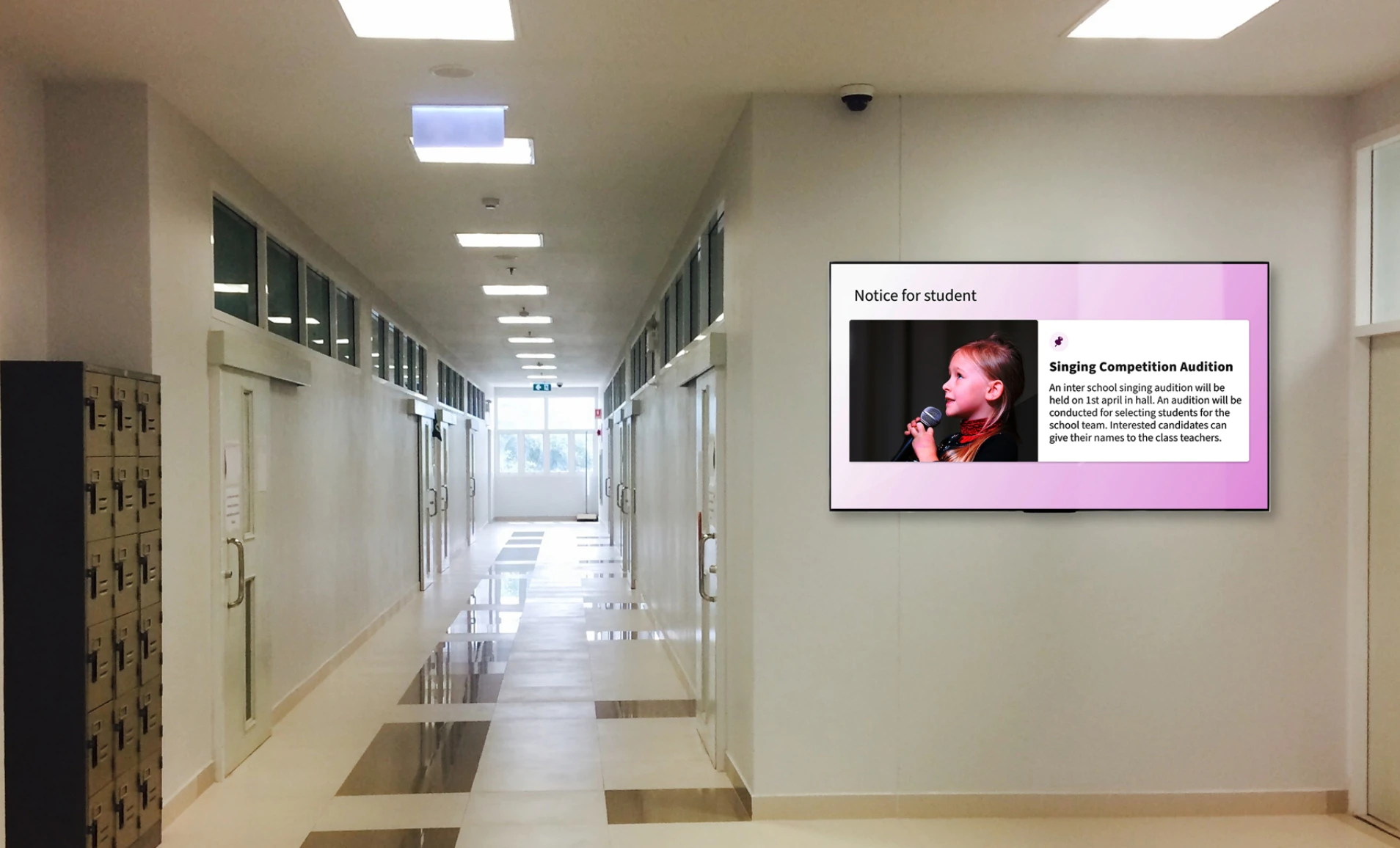 Digital signage screen placed in school corridor showing bulletin board feed using Pickcel digital signage software