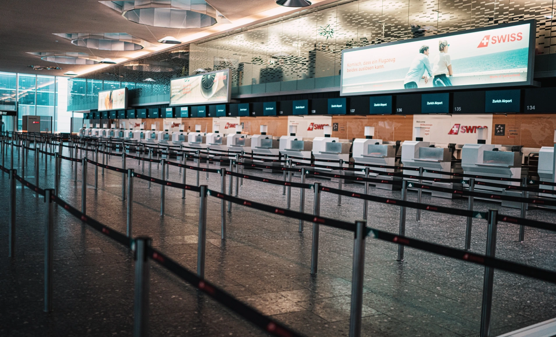 Digital signage screens placed in Airport showing currency exchange rates from Pickcel digital sigange software