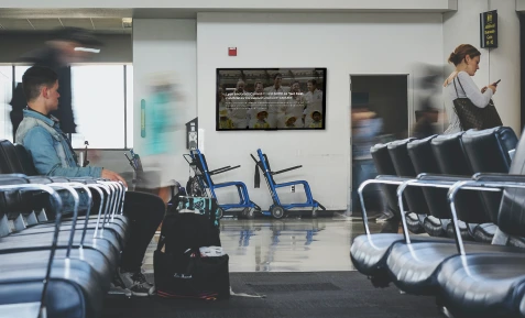 digital signage placed in the hopital waiting lobby displaying news update feed from Pickcel's digital signage NDTV news app