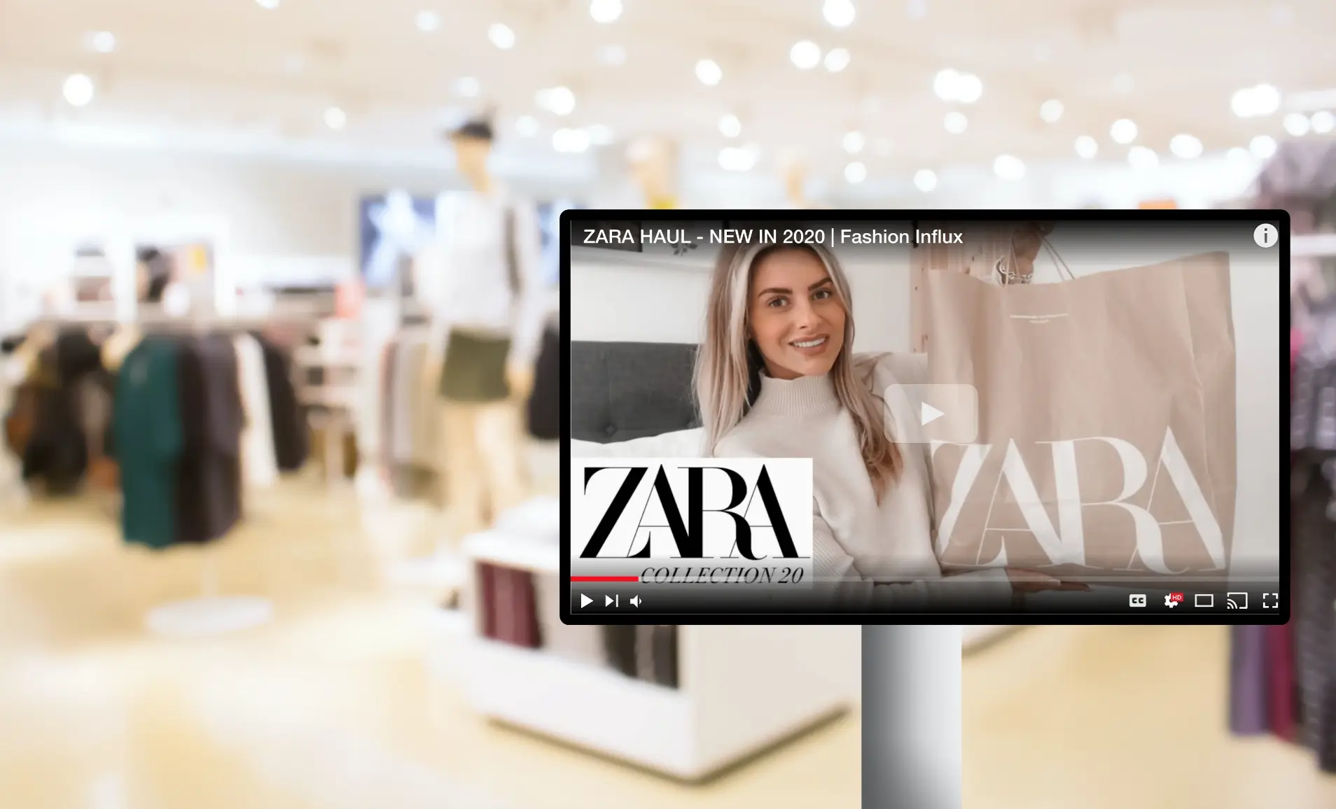 A retail store digital signage displaying product demo video from Youtube video app