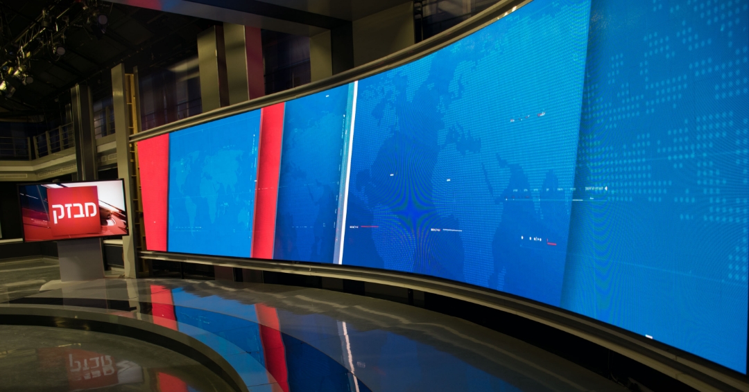 Video wall inside a news studio displaying preview content