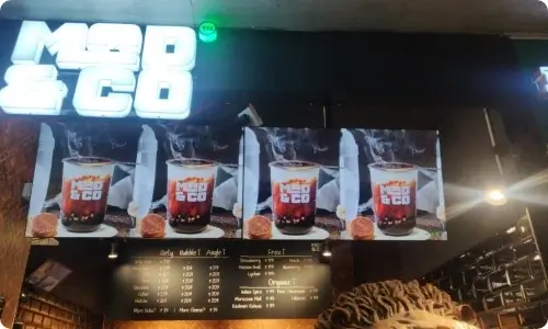Pickcel powered Digital signage dispaly at Mad and Co cafe
