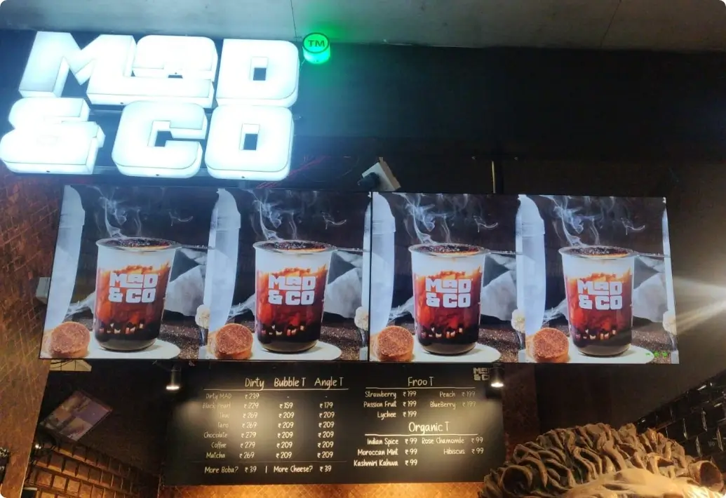 Pickcel powered Digital signage dispaly at Mad and Co cafe