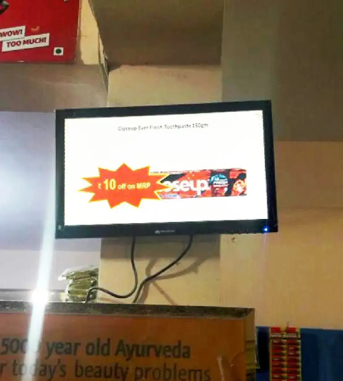 Digital signage content playing on a display at a retail store which is powered by Pickcel