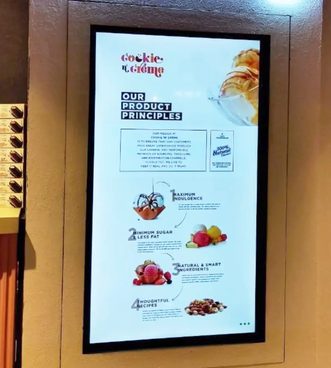 Digital signage menu content playing on a display at a cafe which is powered by Pickcel