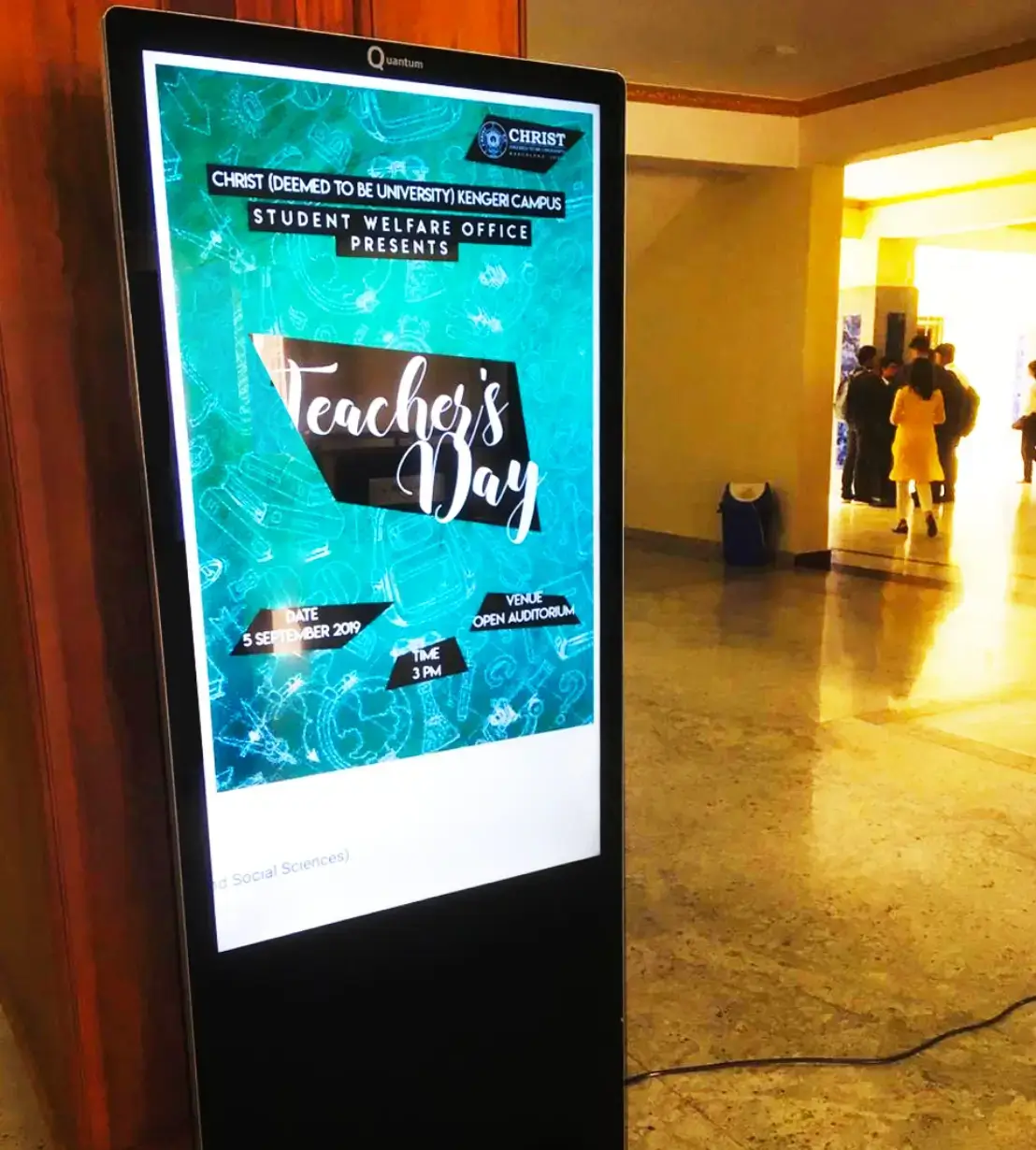 Digital signage content playing on a standee display at an event premises which is powered by Pickcel