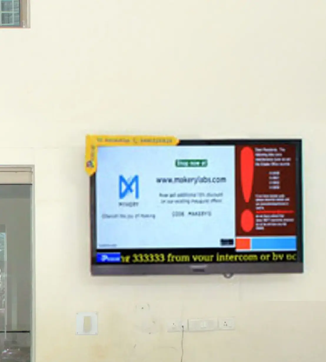 Digital signage content playing on a display at corporate office lobby which is powered by Pickcel