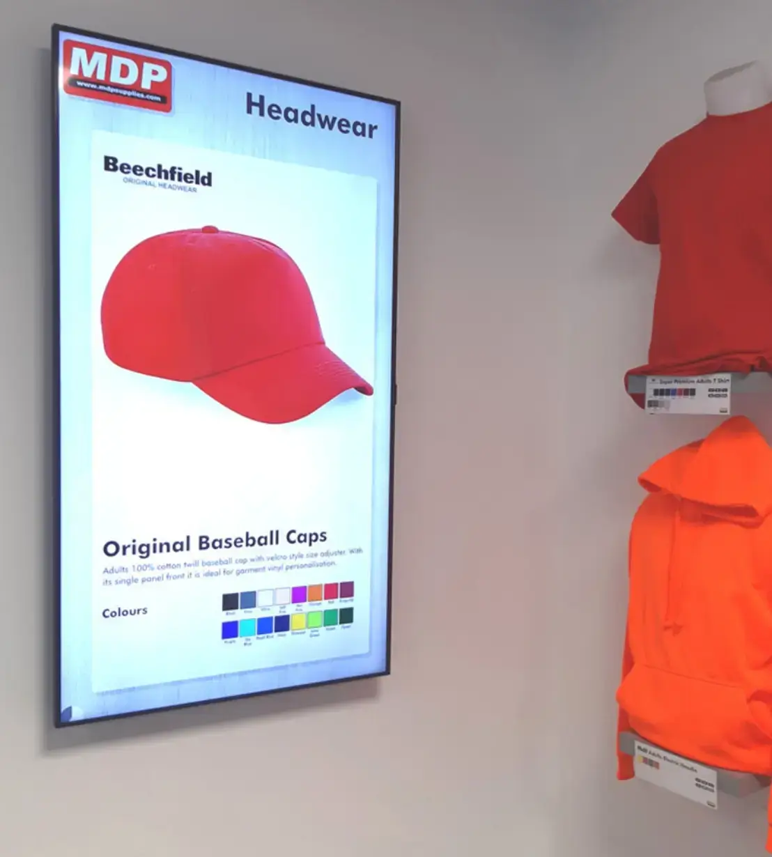 Digital signage content playing on a display at a clothing store which is powered by Pickcel