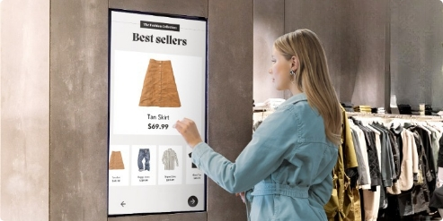 Interactive kiosk displays in clothing store used for visitors to interact with get price information