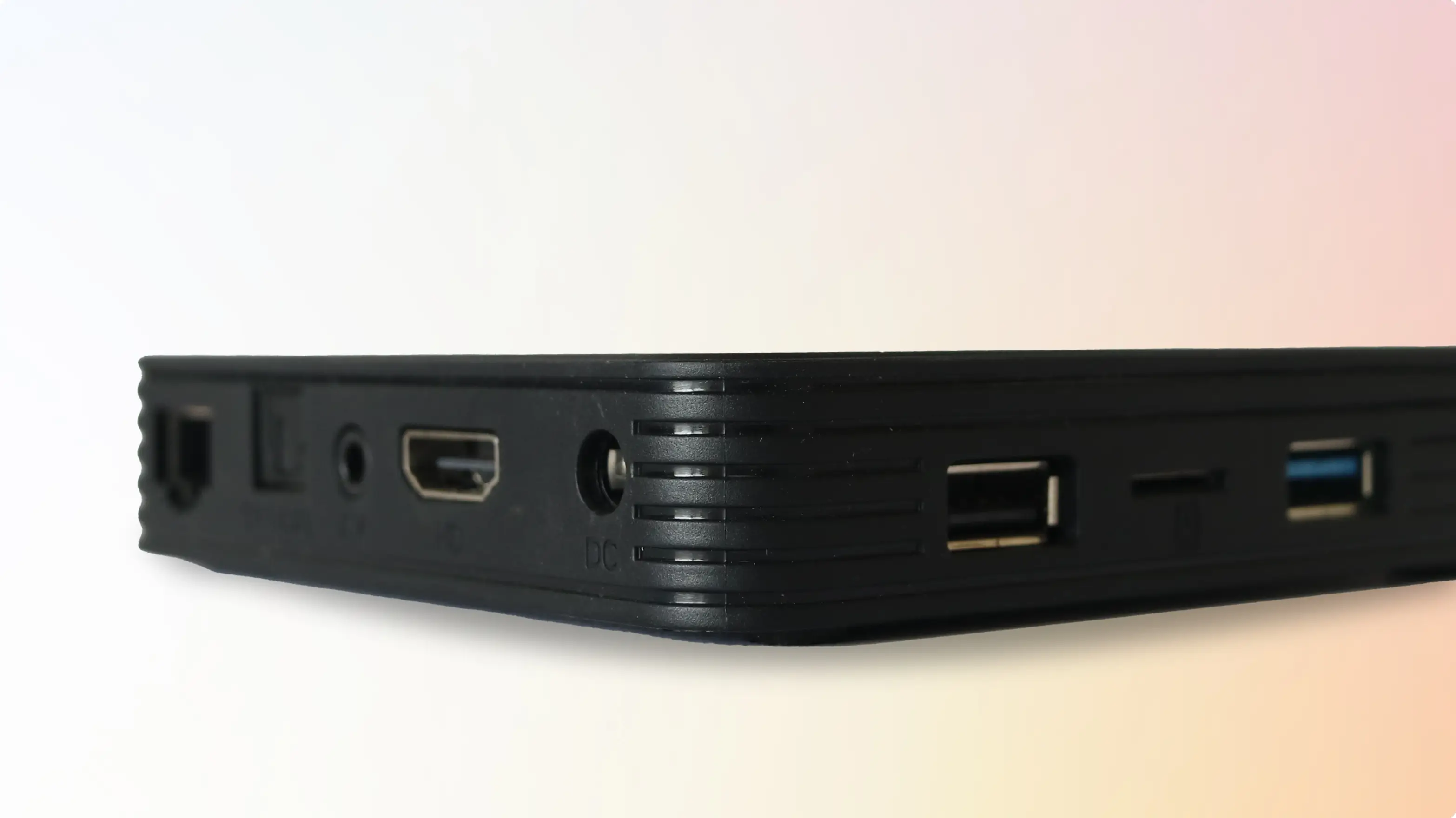 Pickcel Android digital signage media player PX300 with USB, HDMI, Ethernet ports and a slot to connect power adapter.
