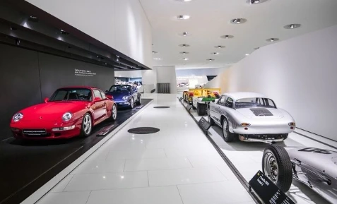 Car dealership display area showing different types of car for sale
