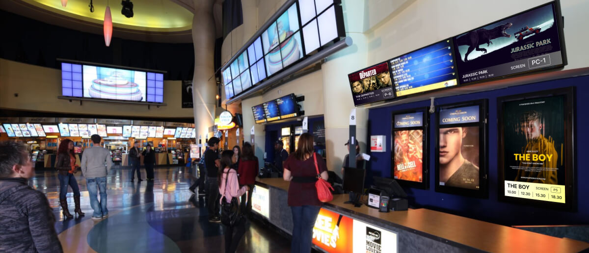 Digital signage screens employed in movie theaters.