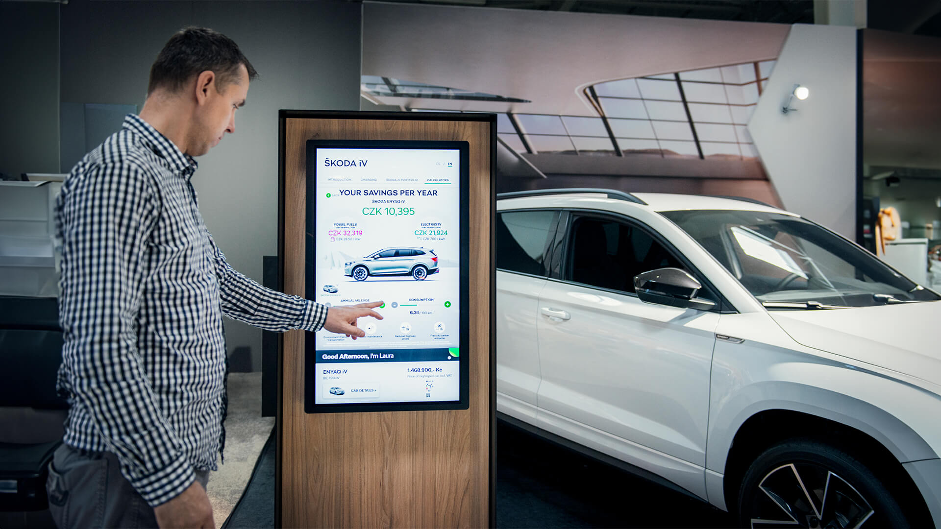  an interactive screen showing the car features at a showroom