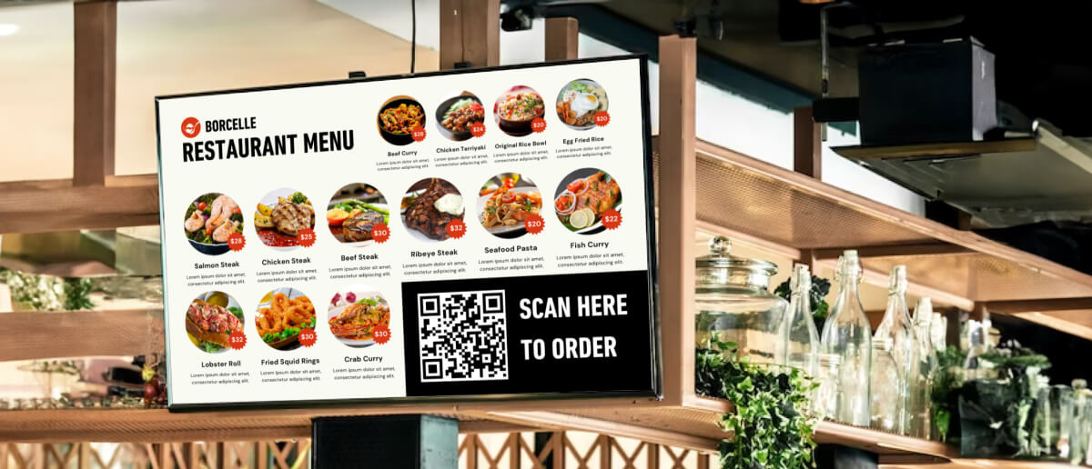 A restaurant using digital signage screen for digital menu ordering options.