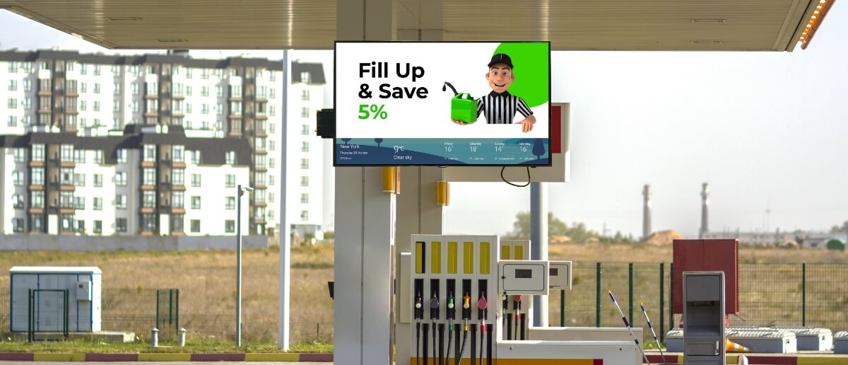gas pump-top digital signage showing discounts on fuel prices