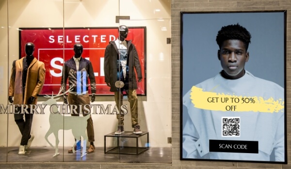Retail window displays of two kinds; traditional with product display (on the left) and modern digital window display (on the right)