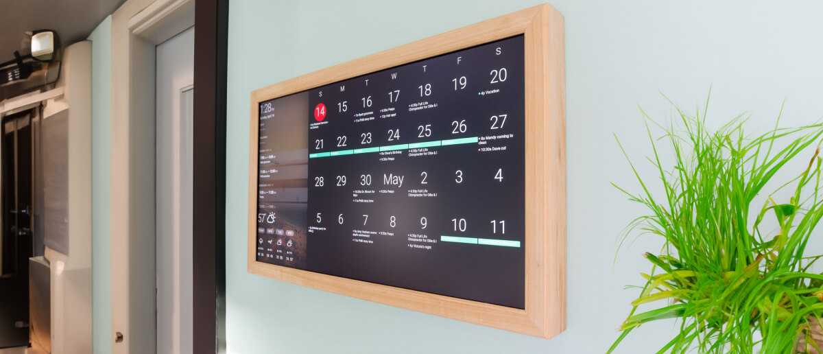 A digital wall calendar in a corporate lobby