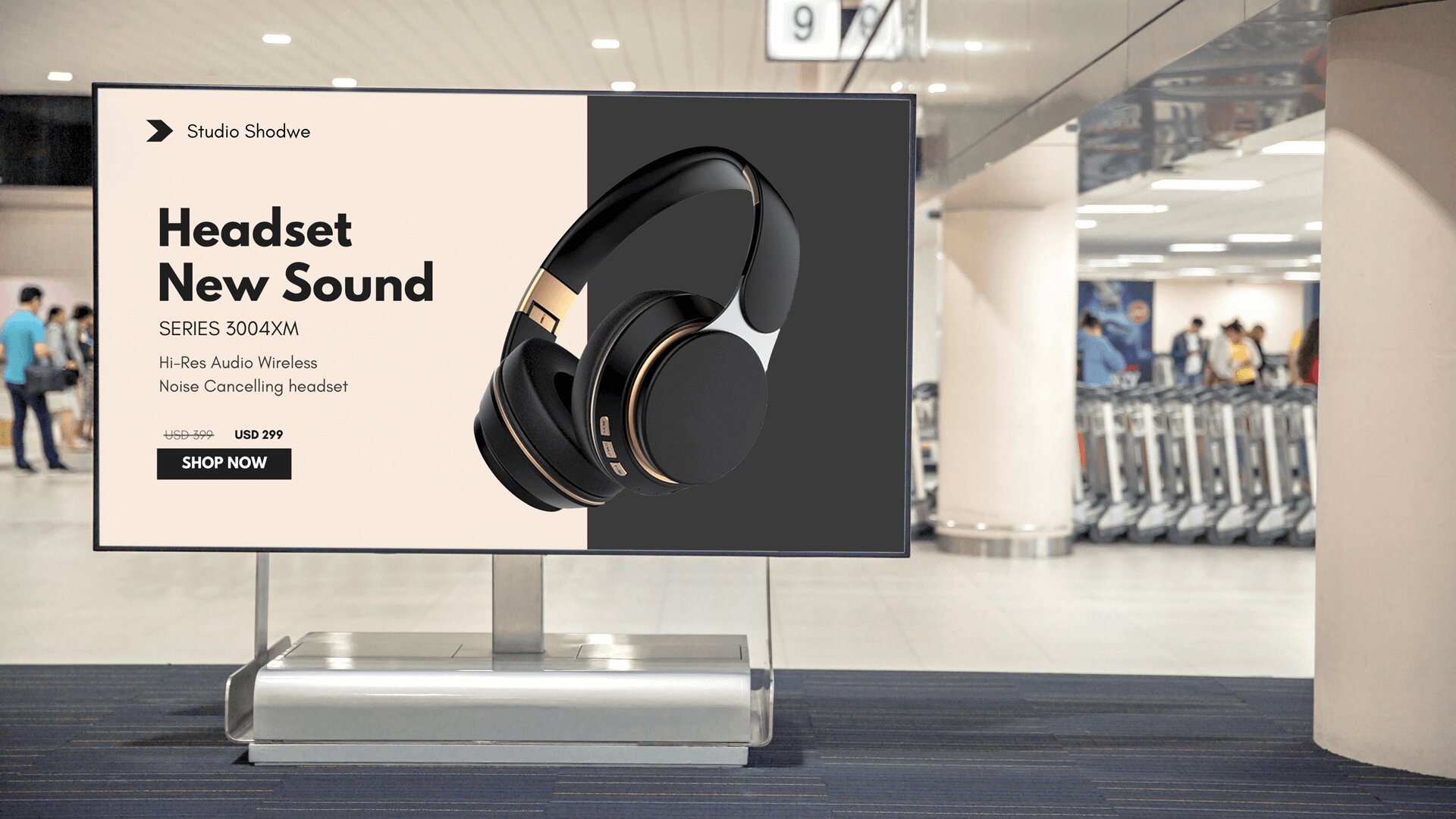 A digital signage screen shows deals on headphones with a ‘Shop Now’ call to action and offer price.