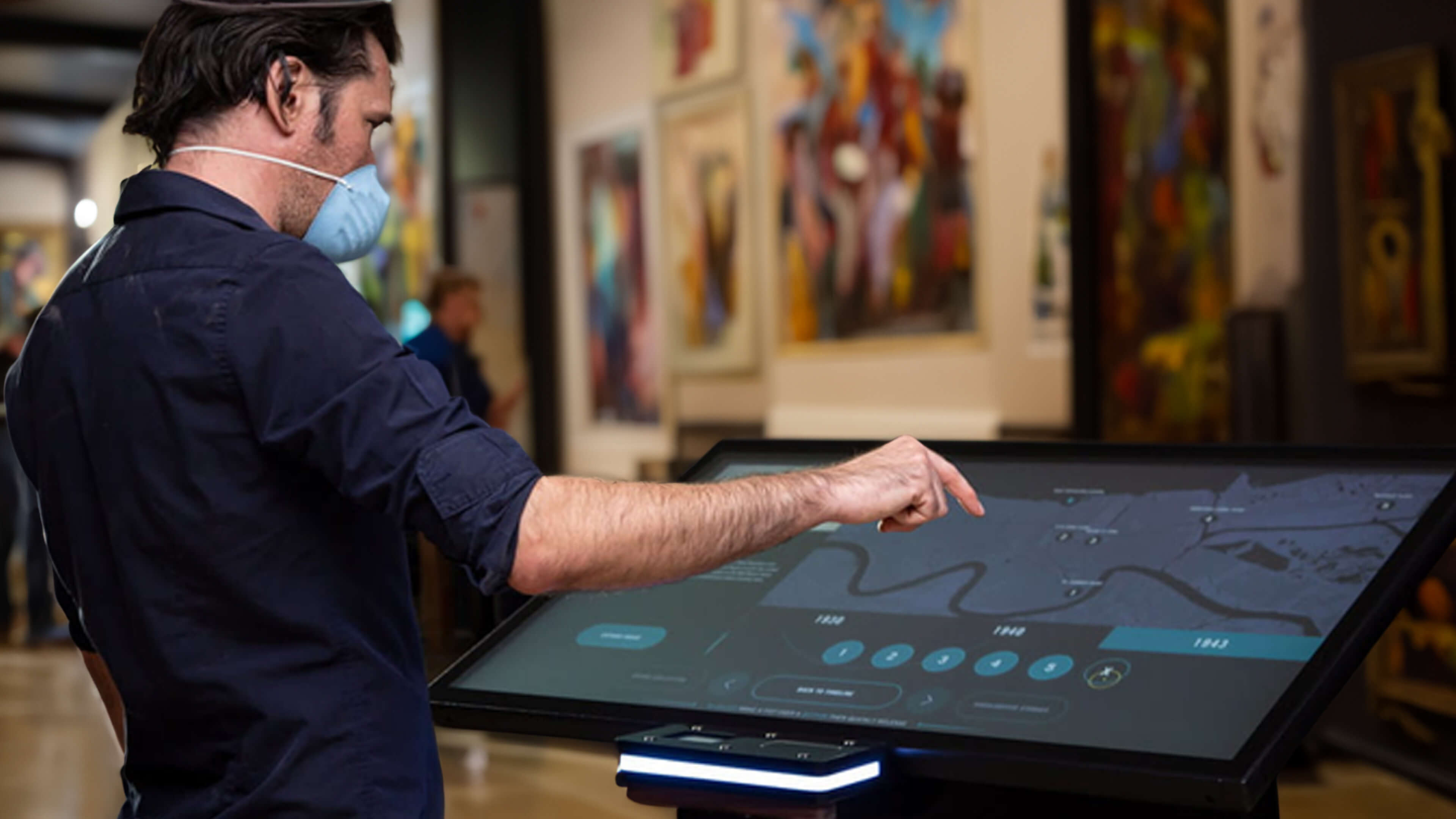 A dynamic digital signage screen operating via gesture-control technology.