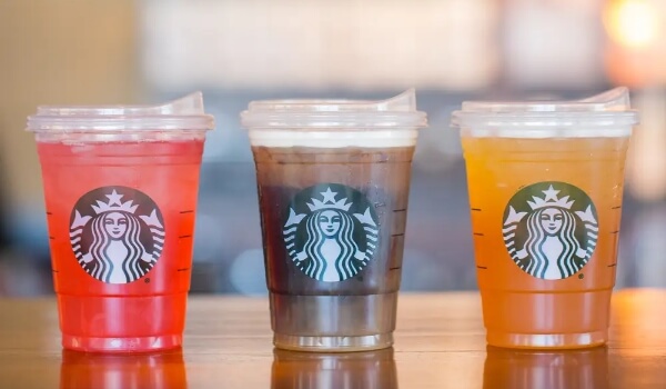 3 Starbucks cups with 3 different drinks show the same Starbucks logo.