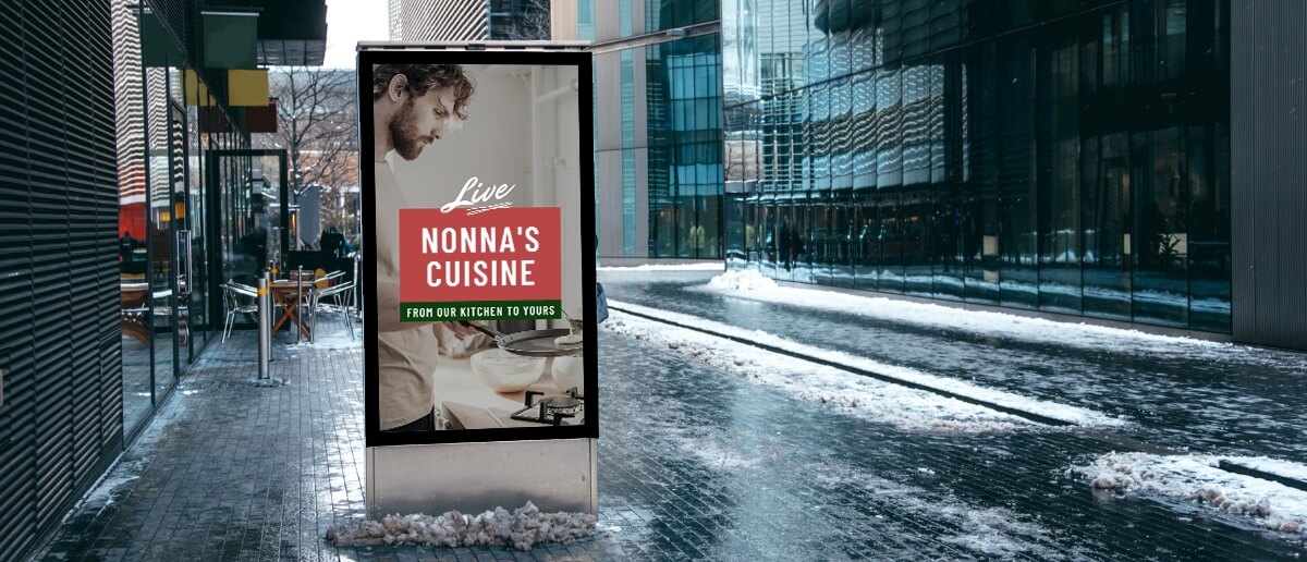 An outdoor digital signage advertises a franchise restaurant business