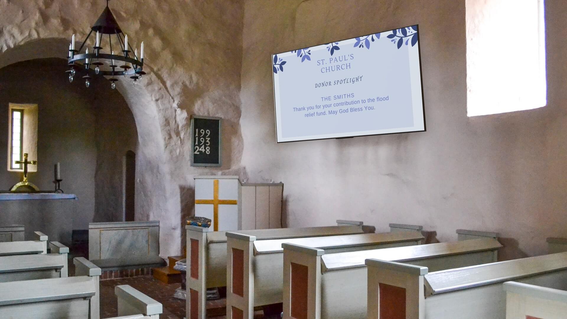 church equipped with digital signage diplay showing fundraising information