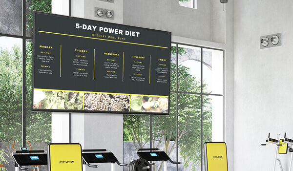 A gym digital signage screen displays a 5-day power diet chart
