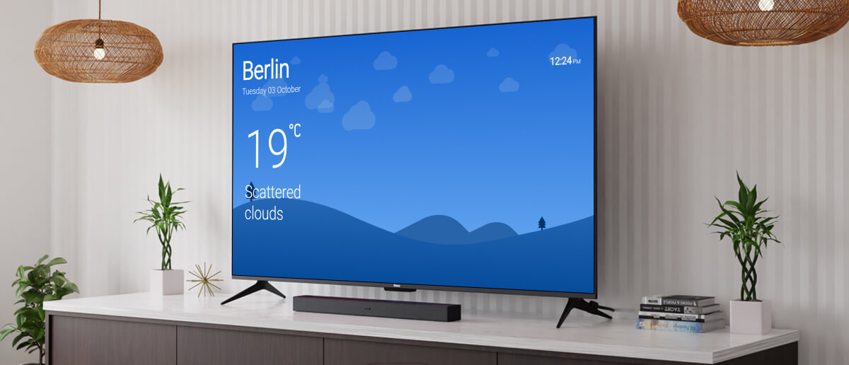 A home digital signage screen showing weather updates