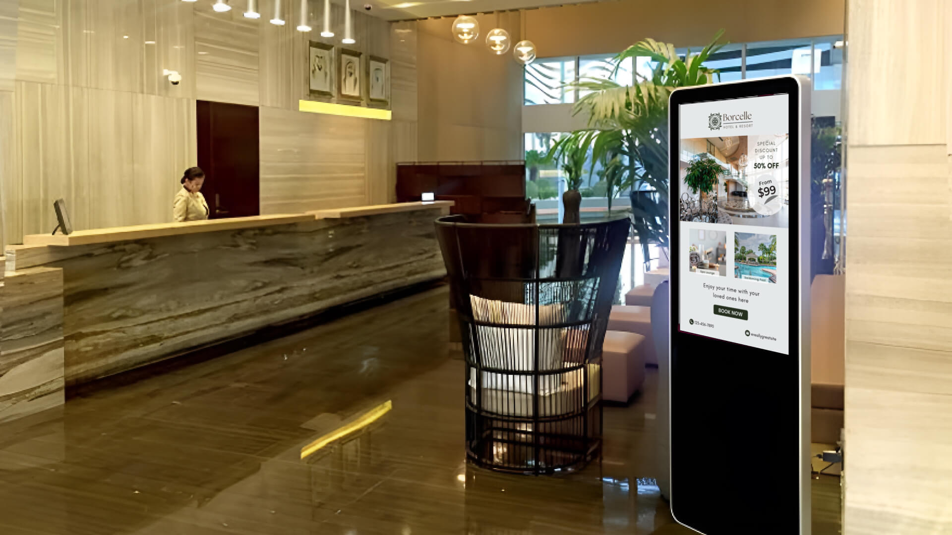 A hotel reception with a digital signage screen kiosk running hotel promotions and events.