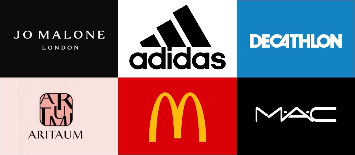 Logos of retail brands like Adidas & McDonald's whose examples of in-store digital signage have been cited in the blog