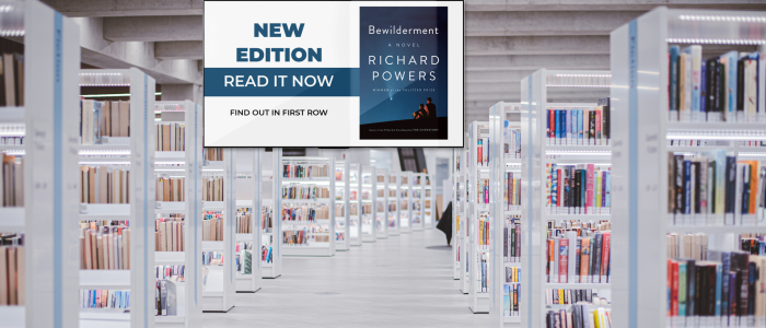 A school library shows book recommendations on a hanging digital signage display