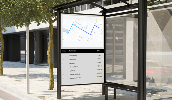 bus stop equipped with digital signage screen showing map with bus route information