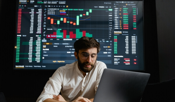 Bank digital signage used as a market wall showing uninterrupted updates on stocks and shares