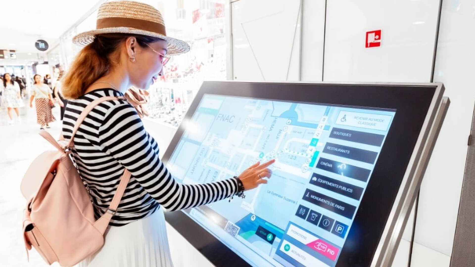 an interactive wayfinding sign at an office lobby