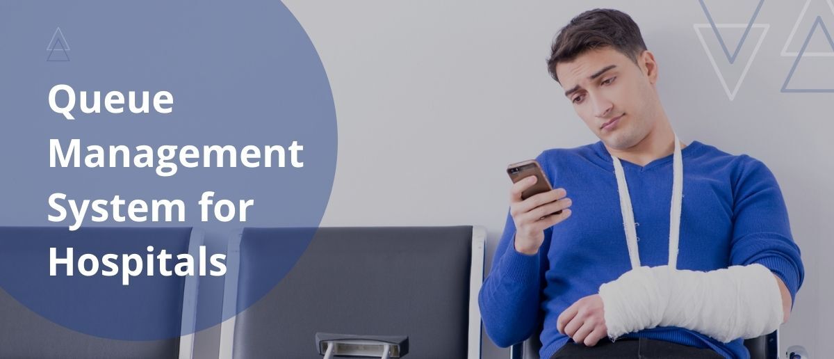 patient checking smartphone for his token number at clinic waiting room